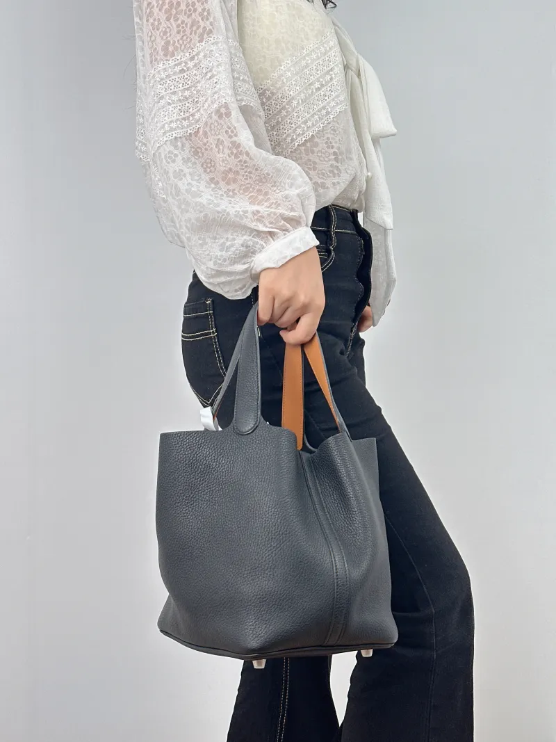 Hermès Top Handle Bag Picotin Lock 22 22 Black Colorblock Taurillon Clemence TC Calfskin Medium 22 × 18 × 21 cm A — on-model view 2 of 2