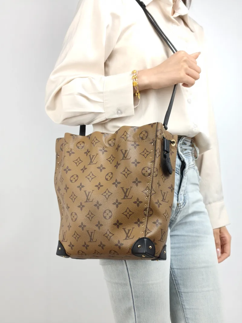 Louis Vuitton Shoulder Bag NOÉ TRUNK Monogram PVC Small 23 × 8 × 27 cm — on-model view 2 of 2