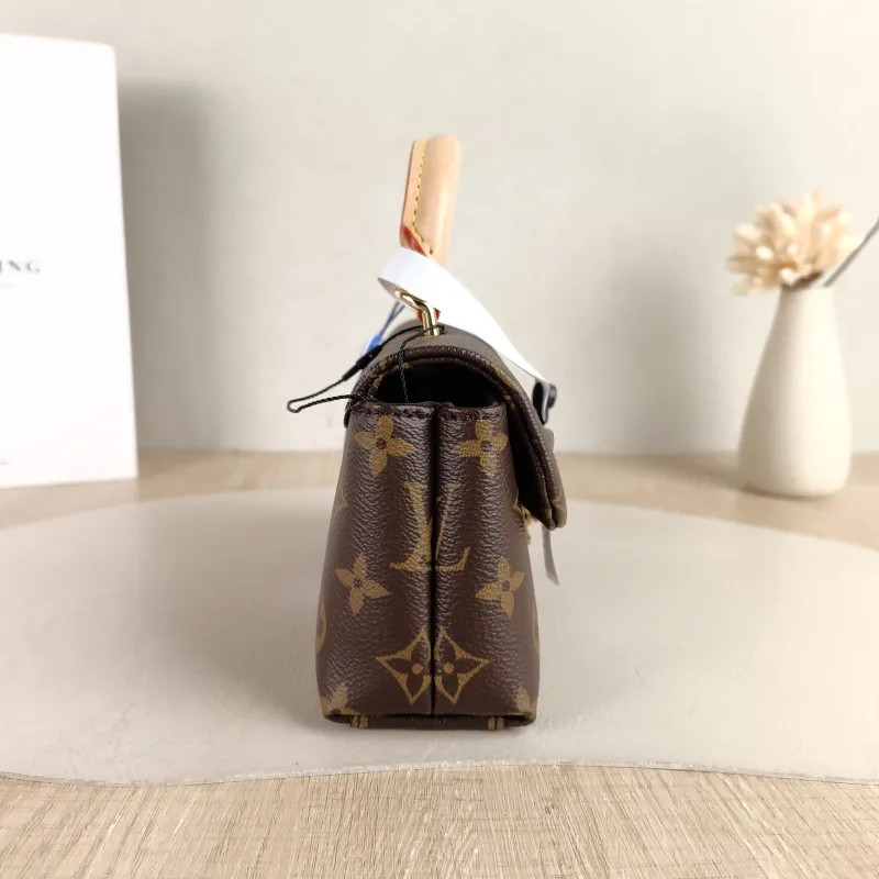 Louis Vuitton Crossbody Bag MADELEINE Monogram PVC nano 21 × 6 × 12.5 cm — detail view 4 of 11