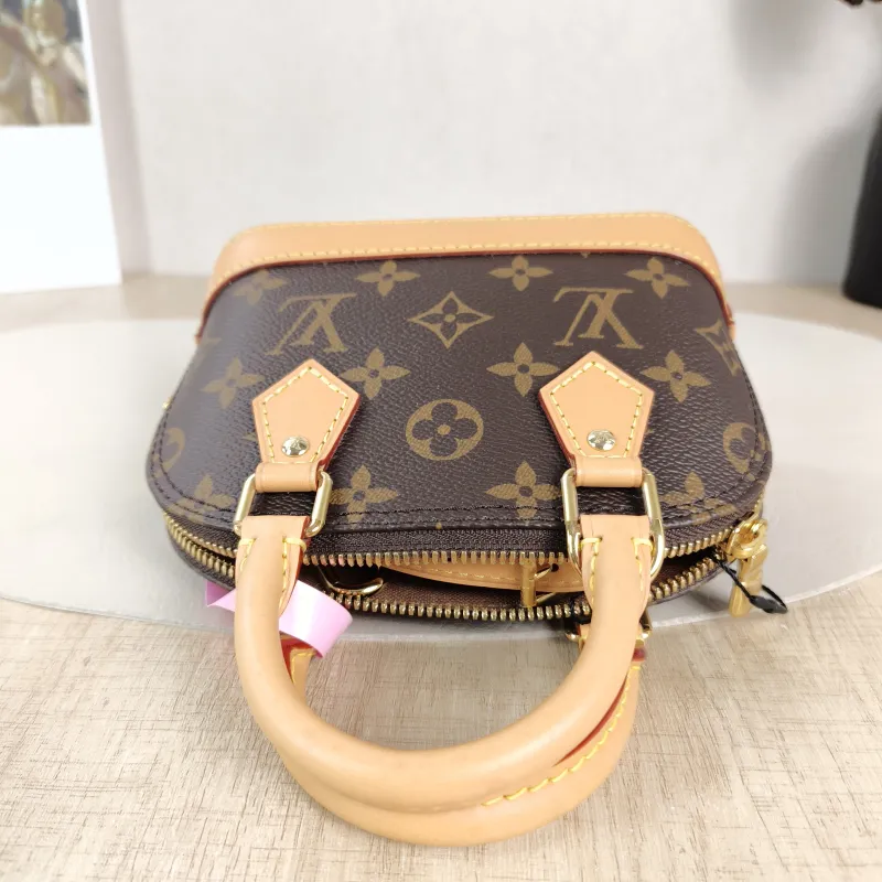 Louis Vuitton Crossbody Bag Alma Nano Monogram PVC nano 18 × 8 × 12 cm — detail view 3 of 10