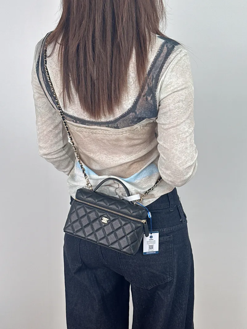 Chanel Crossbody Baglp Box Bag Top Handle Crossbody Bag Black Grained Calfskin 19.5 × 5 × 17 cm — on-model view 3 of 3
