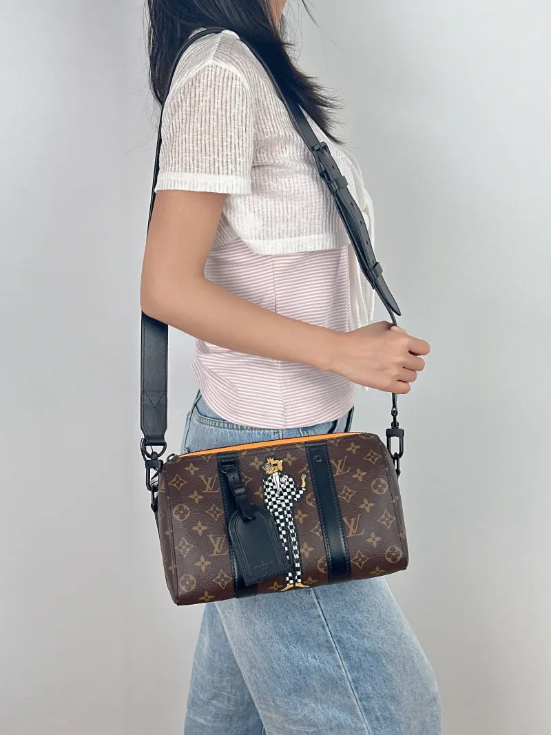 Louis Vuitton Crossbody Bag City Keepall Monogram PVC Medium27 × 13 × 17 cm — on-model view 1 of 2