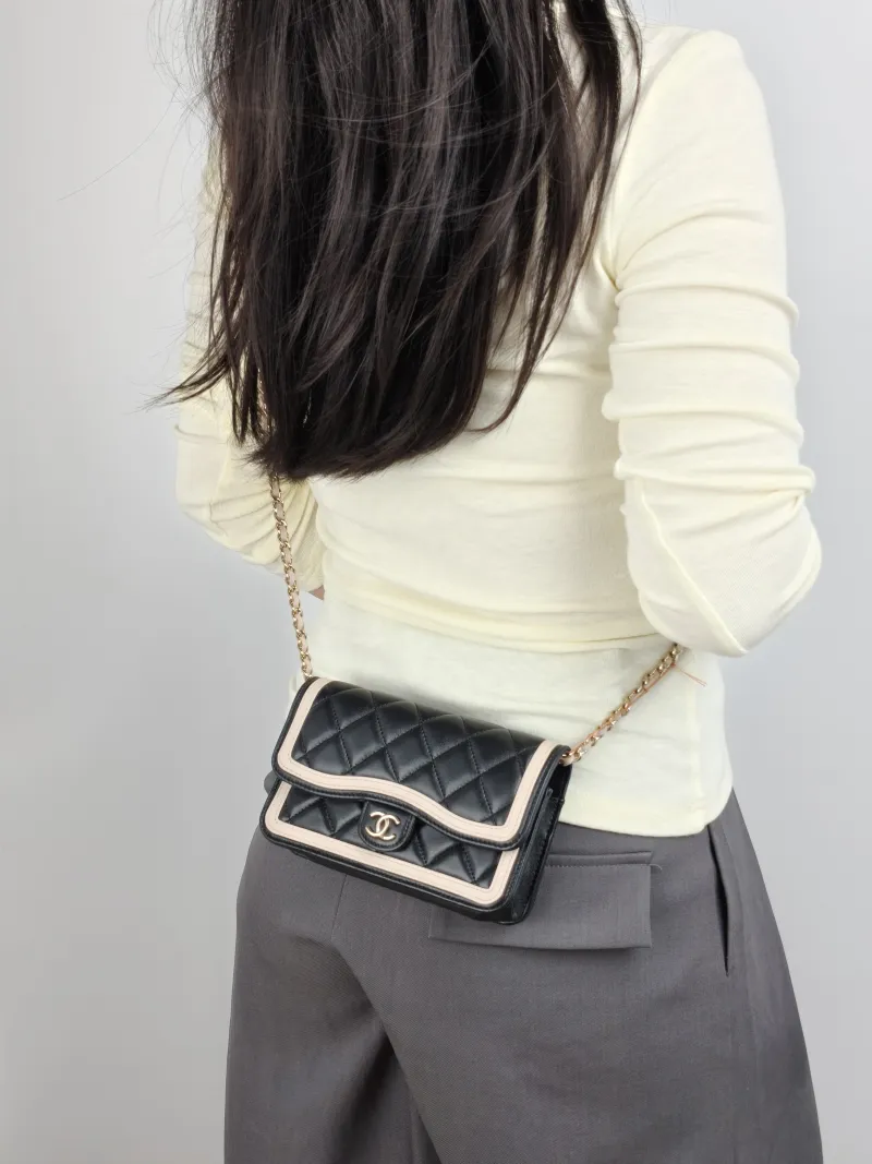 Chanel Crossbody Bag CF Mini WOC Crossbody Bag Black Pink Lambskin One Size 17 × 4 × 10 cm — on-model view 1 of 2