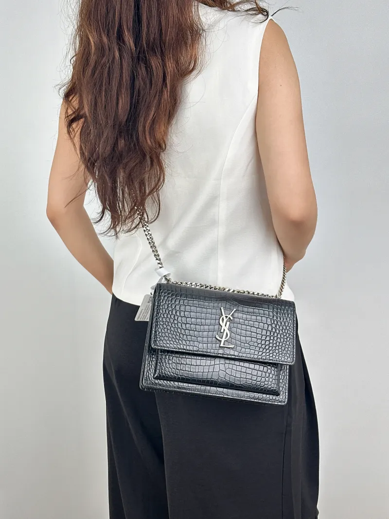SAINT LAURENT Crossbody Bag SUNSET Black CC alfskin Medium22 × 6.5 × 16 cm Leather Tag — on-model view 2 of 2