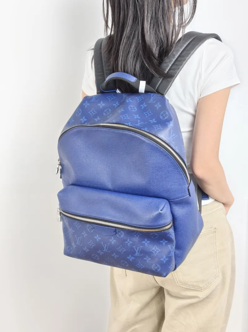 Louis Vuitton Backpack Discovery Backpack Blue PVC · Calfskin Small 37 × 20 × 40 cm — on-model view 1 of 2