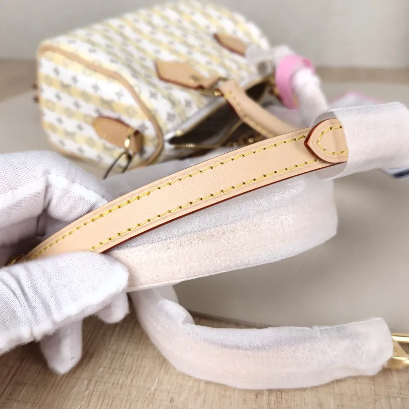 Louis Vuitton Crossbody Bag Speedy Nano White Yellow Monogram PVC nano 16 × 7.5 × 10 cm — detail view 8 of 11
