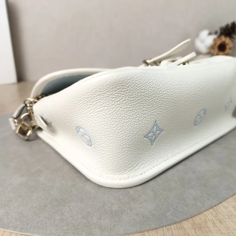 Louis Vuitton Crossbody Bag Diane Baguette Bag White · Blue Empreinte Embossed Calfskin Monogram Small24 × 9 × 15 cm — detail view 15 of 15