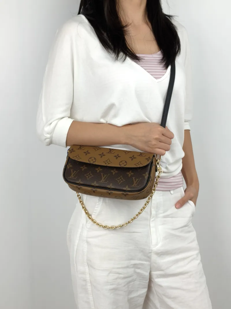 Louis Vuitton Crossbody Bag IVY Monogram PVC Small 23.5 × 4.3 × 12 cm — on-model view 2 of 3