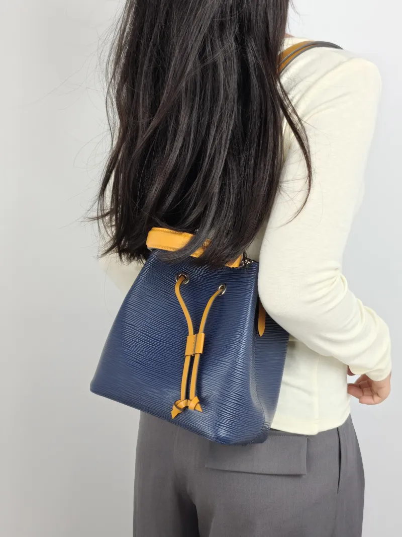 Louis Vuitton Crossbody Bag NÉONOÉ Bucket Bag BB Blue · Yellow Epi Embossed Calfskin BB 20 × 13 × 20 cm — on-model view 1 of 3
