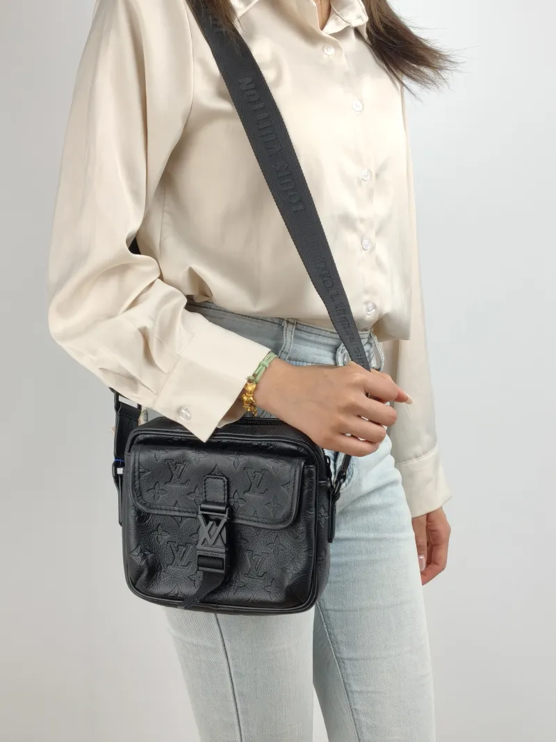 Louis Vuitton Crossbody Bag Getaway Messenger Bag Black Calfskin One Size 18 × 7.8 × 17 cm — on-model view 1 of 2