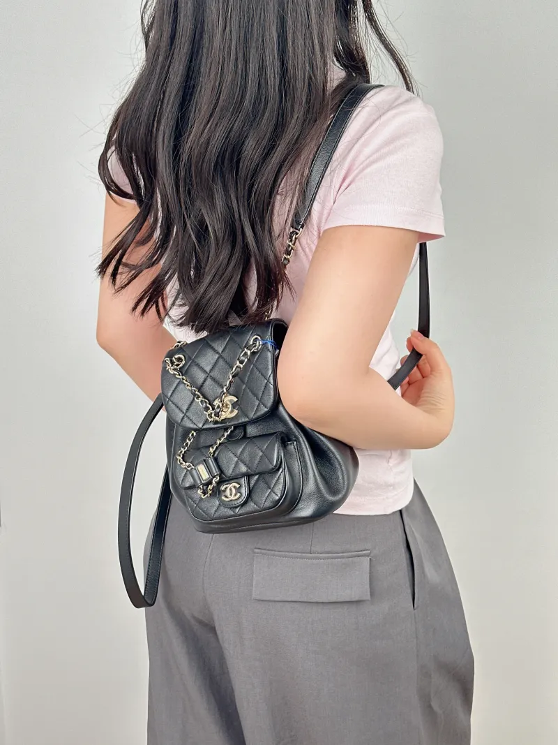 Chanel Backpack Duma Black Calfskin Small18 × 12 × 18.5 cm — on-model view 1 of 2
