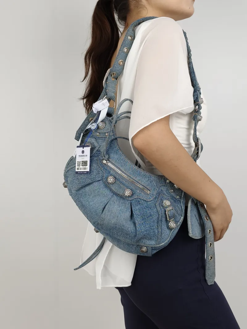 BALENCIAGA Crossbody Bag LE CAGOLE Blue Small33 × 8.5 × 16 cm — on-model view 2 of 2