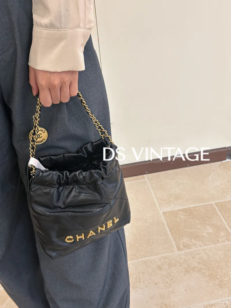 Chanel Shoulder Bag 22Bag Black CC alfskin Mini 20 × 6 × 19 cm — on-model view 2 of 3