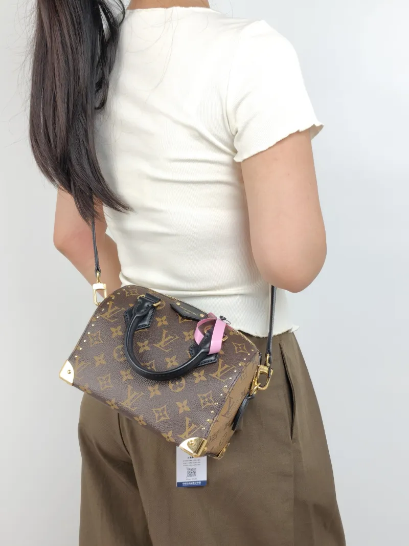 Louis Vuitton Crossbody Bag Speedy Trunk 20 Monogram PVC Small 20.5 × 11 × 13.5 cm — on-model view 1 of 3