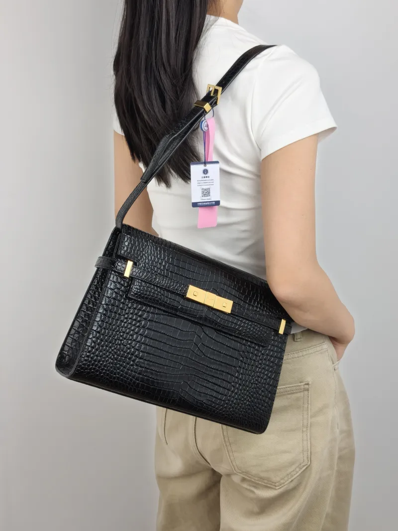 SAINT LAURENT Shoulder Bag MANHATTAN Black Calfskin Medium 29 × 7.5 × 20 cm — on-model view 1 of 2