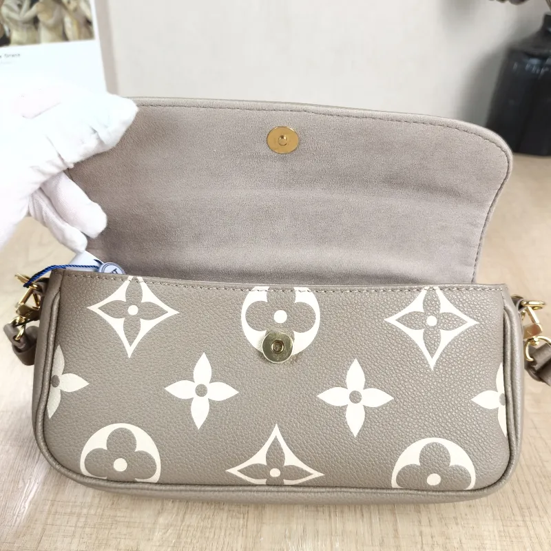 Louis Vuitton Crossbody Bag IVY Monogram Empreinte Embossed Calfskin Small 23.5 × 4.3 × 12 cm — detail view 9 of 13