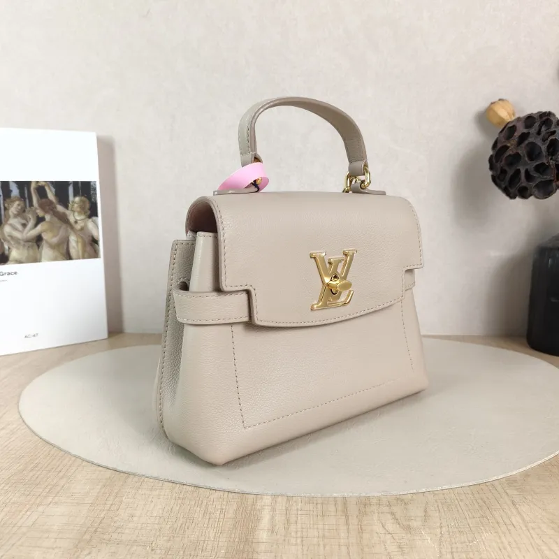 Louis Vuitton Crossbody Bag Lockme Ever Top Handle Bag Calfskin Mini 23 × 10 × 17 cm — cover view 6 of 6