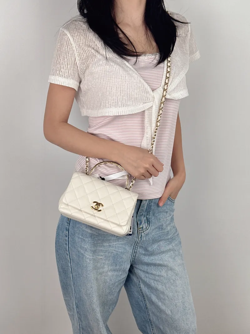 Chanel Crossbody Bag White Calfskin One Size18 × 7 × 11.5 cm — on-model view 2 of 3