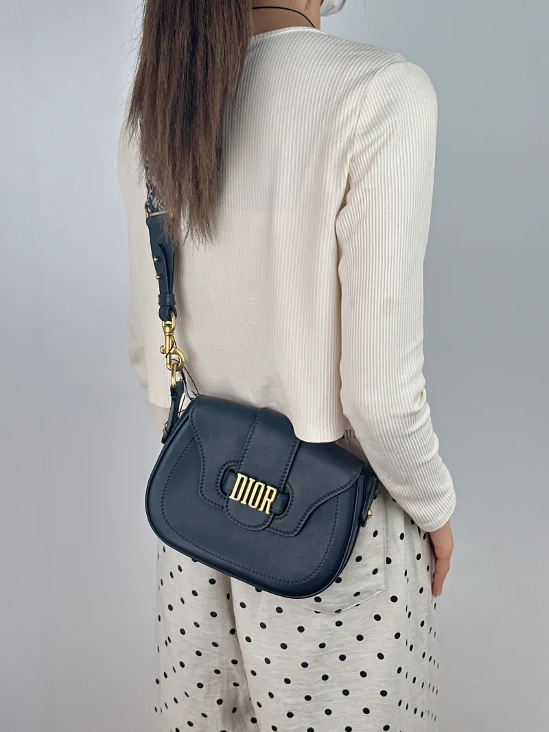 DIOR Crossbody Bag D-Fence Black Calfskin Medium 22.5 × 5 × 17.5 cm — on-model view 2 of 2
