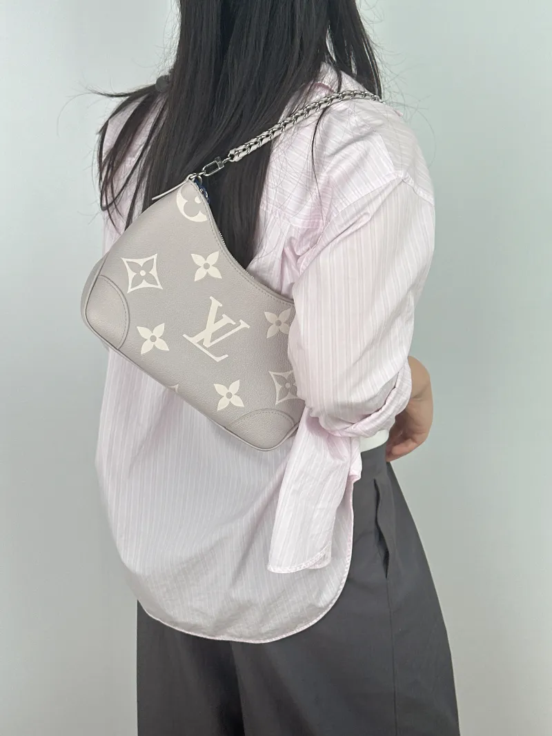 Louis Vuitton Crossbody Bag Boulogne Grey Empreinte Embossed Calfskin Small 26 × 9.5 × 16 cm — on-model view 1 of 2