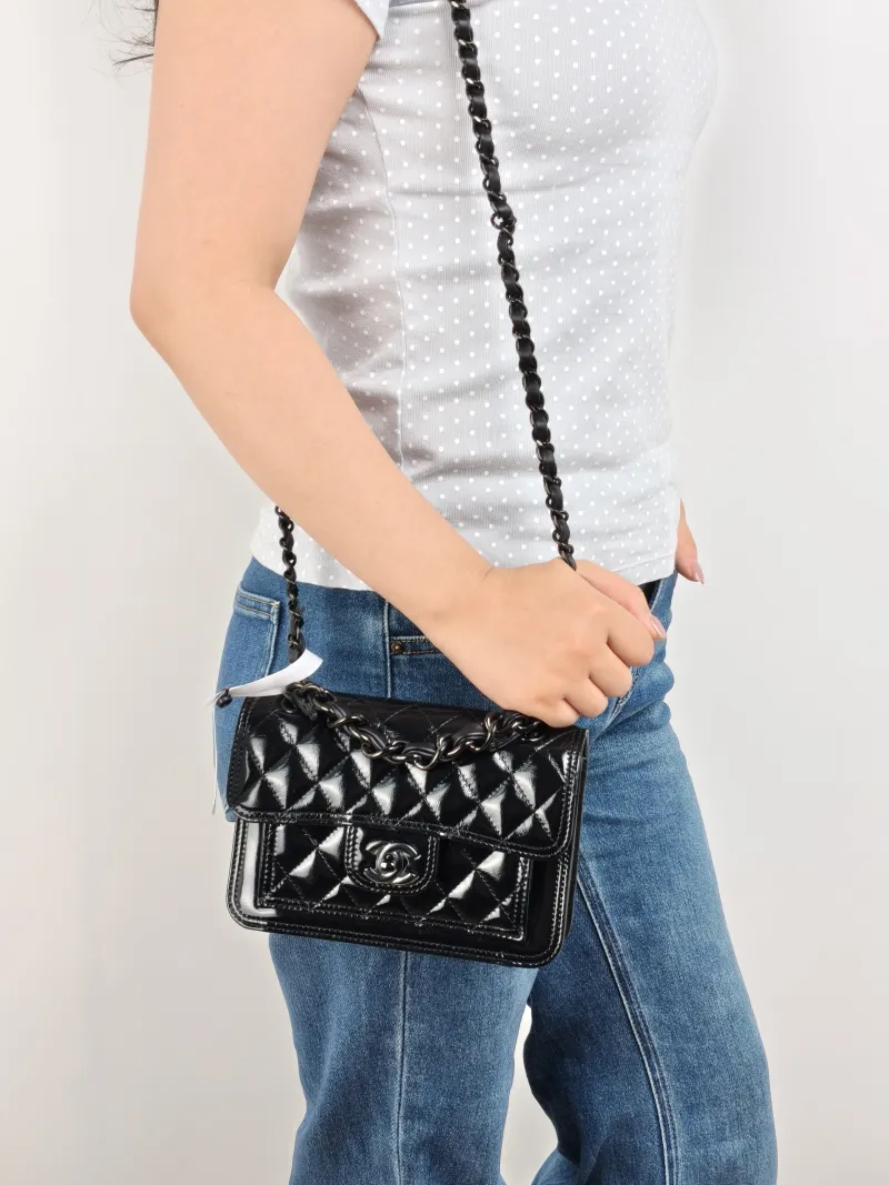 Chanel Crossbody Bag 23s Messenger Bag Black Waxed Leather Mini 19.5 × 6 × 13 cm — on-model view 2 of 3
