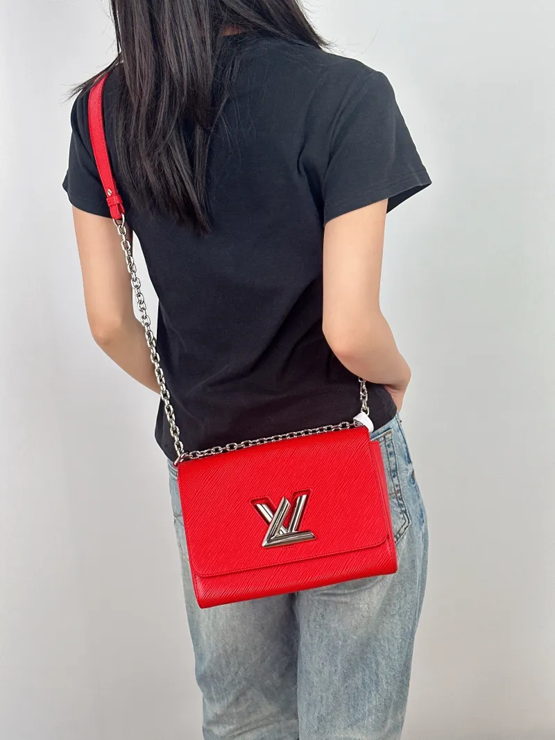 Louis Vuitton Crossbody Bag Twist Red Epi Embossed Calfskin Medium 23 × 9.5 × 17 cm — on-model view 1 of 3