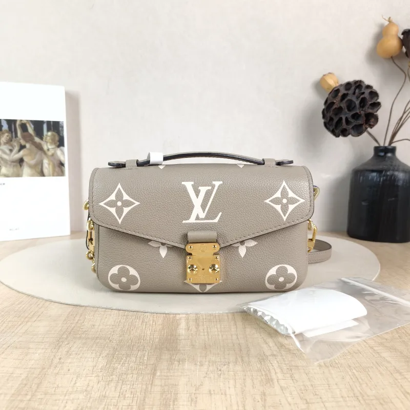 Louis Vuitton Crossbody Bag Pochette Métis East West Monogram Empreinte Embossed Calfskin Small 21.5 × 6 × 13.5 cm — cover view 3 of 6