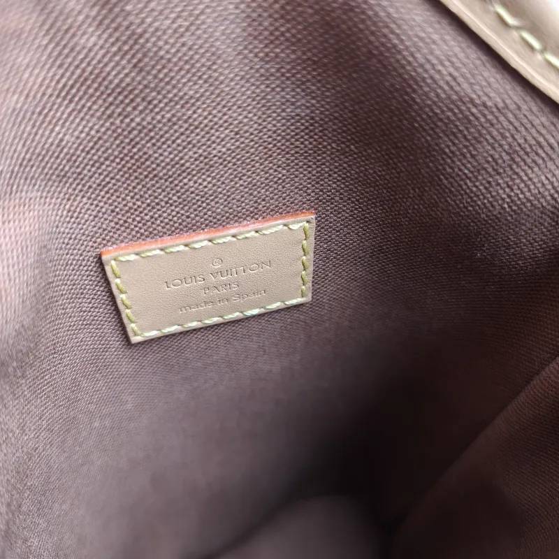 Louis Vuitton Crossbody Bag Fold Me Monogram PVC Mini 14.5 × 6.5 × 18 cm — detail view 6 of 10
