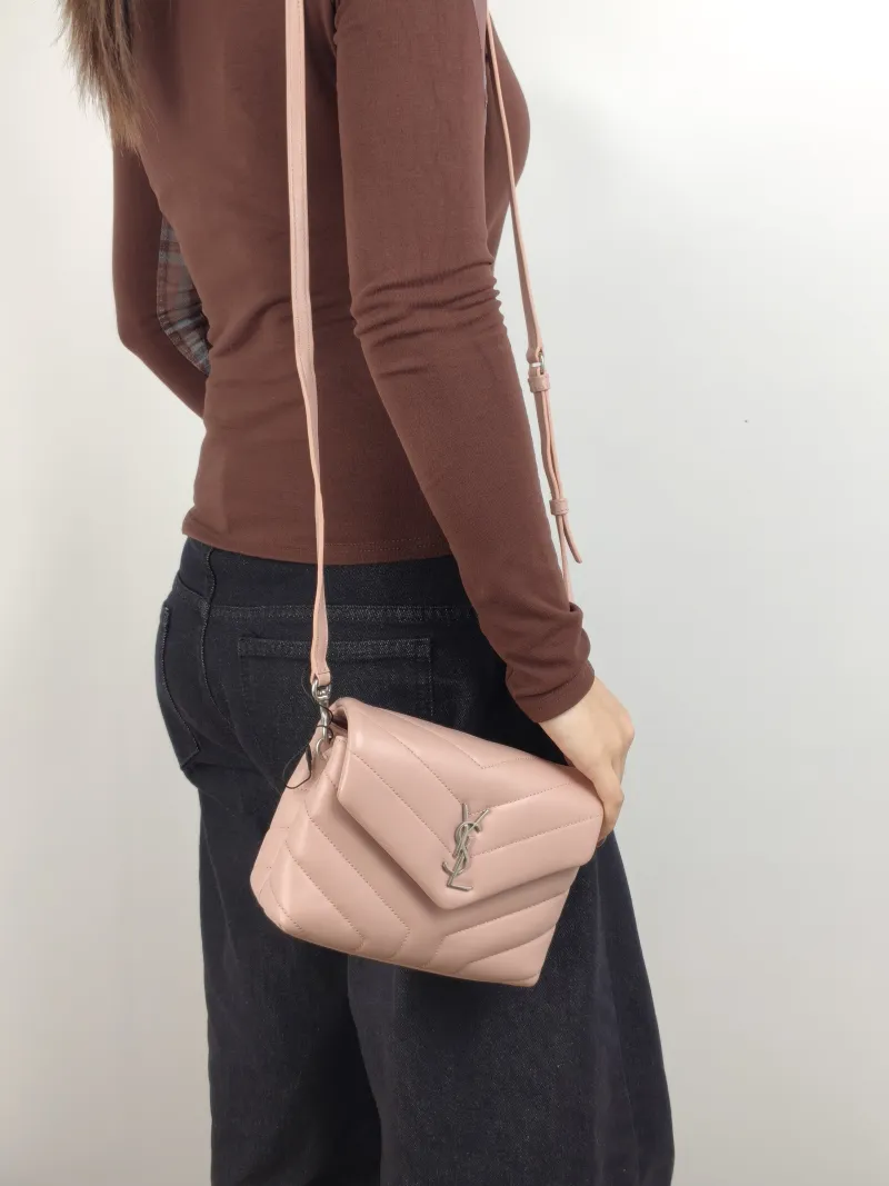 SAINT LAURENT Shoulder Bag LOULOU Pink Calfskin Mini 20 × 7.5 × 14 cm — on-model view 1 of 2