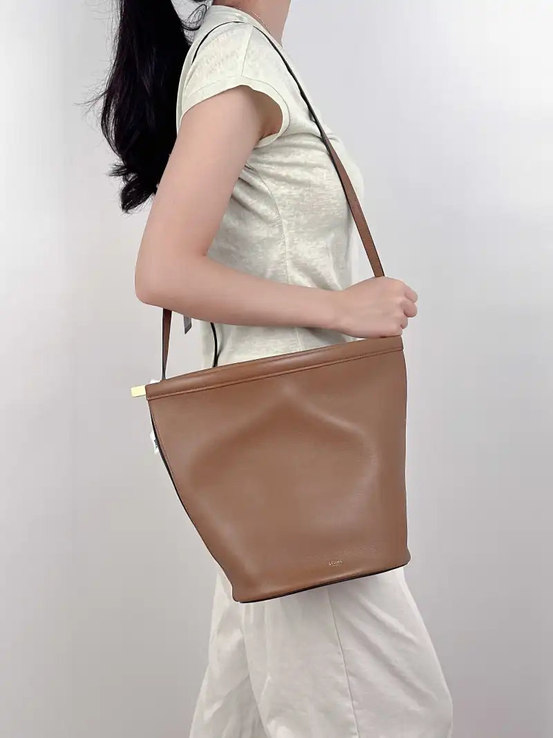 CELINE Crossbody Bag Clasp Bucket Bucket Bag Brown Calfskin One Size20 × 13.5 × 26 cm — on-model view 1 of 3