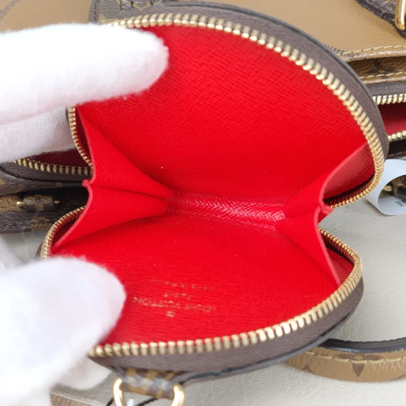 Louis Vuitton Crossbody Bag Onthego East West Monogram PVC Small 25 × 10 × 13 cm — detail view 9 of 15