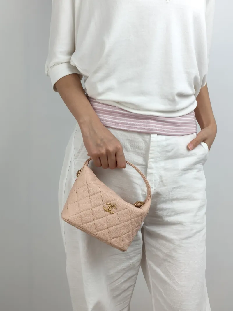 Chanel Crossbody Bag Crossbody Bag Pink Gold-Tone Hardware Grained Calfskin One Size 21.5 × 7.5 × 19 cm — on-model view 2 of 3