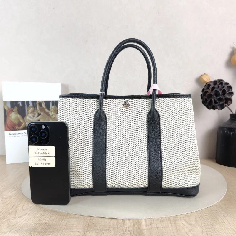 Hermès Top Handle Bag Garden Party 30 30 Beige · Black Canvas · Negonda Calfskin Medium 30 × 13 × 21 cm B — cover view 4 of 6