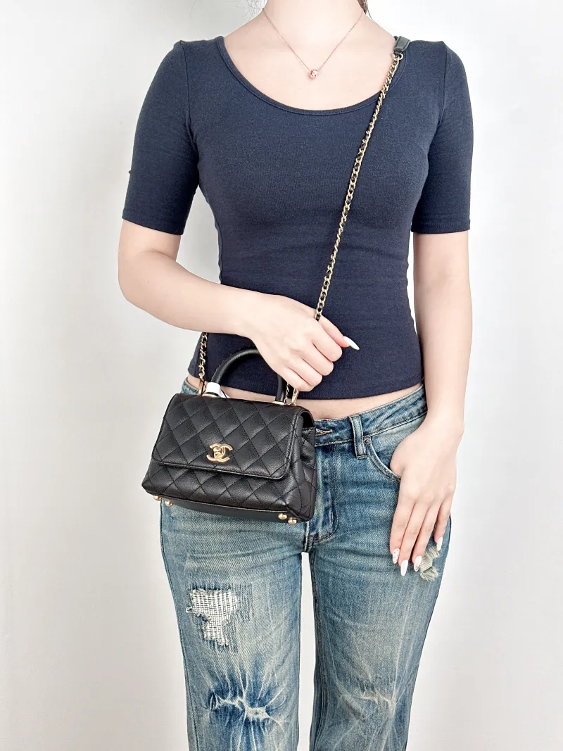 Chanel Crossbody Bag Edition coco handle Black Grained Calfskinmini19 × 9 × 13 cm — on-model view 1 of 3
