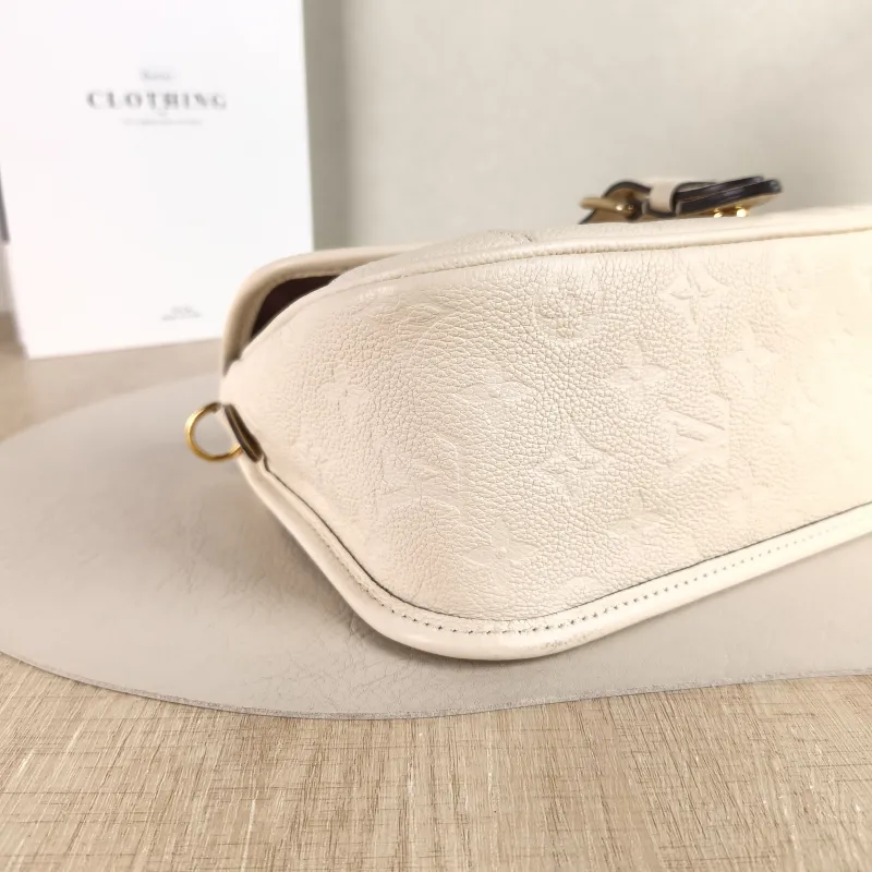 Louis Vuitton Crossbody Bag Diane Baguette Bag White Monogram Empreinte Embossed Calfskin Small 24 × 9 × 15 cm — detail view 10 of 12