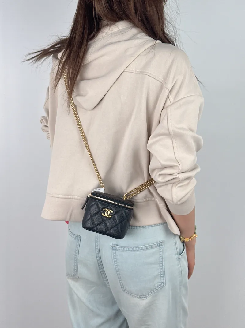 Chanel Crossbody Bag Edition Black Grained Calfskin nano 10 × 7 × 9 cm — on-model view 2 of 2
