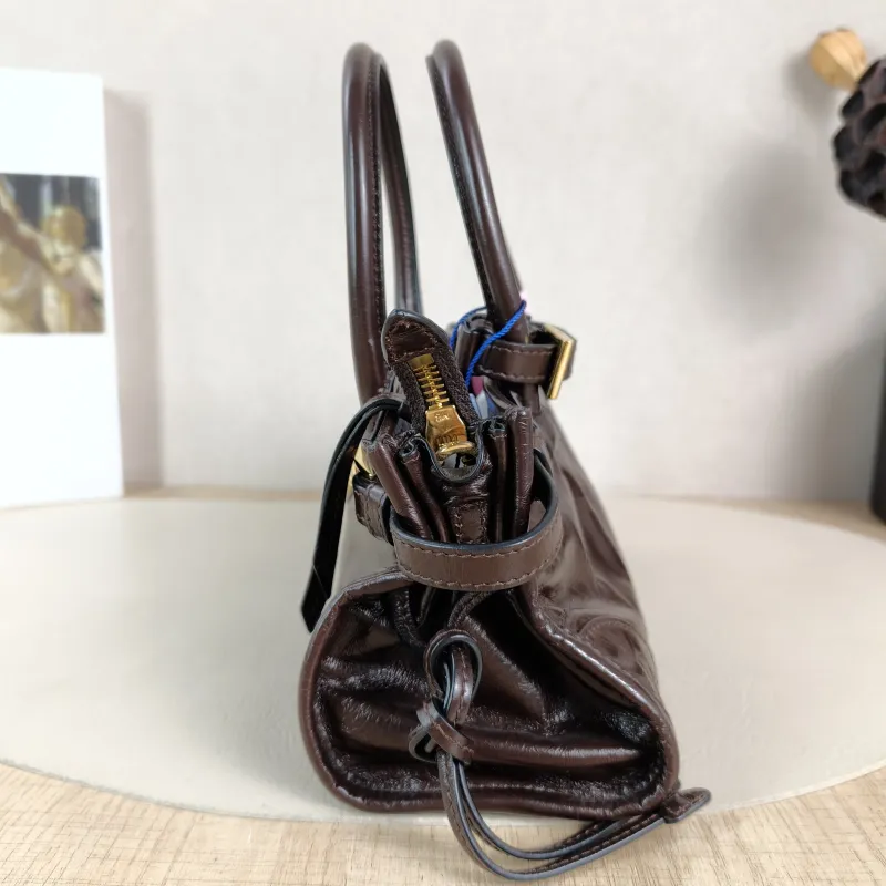 PRADA Top Handle Bag Bonnie Soft Lux Brown Waxed Leather Mini 23.5 × 9 × 12 cm — detail view 7 of 13