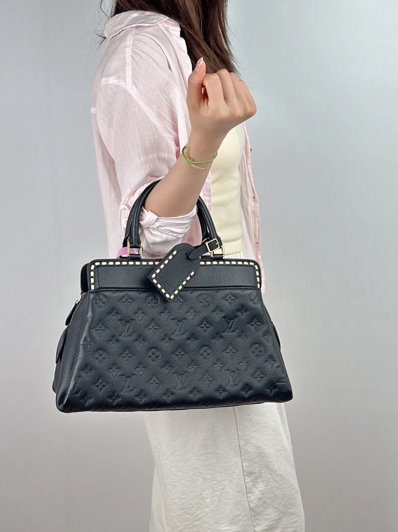 Louis Vuitton Top Handle Bag VOSGES Top Handle Crossbody Bag Black Calfskin One Size 35 × 13 × 22 cm — on-model view 2 of 2