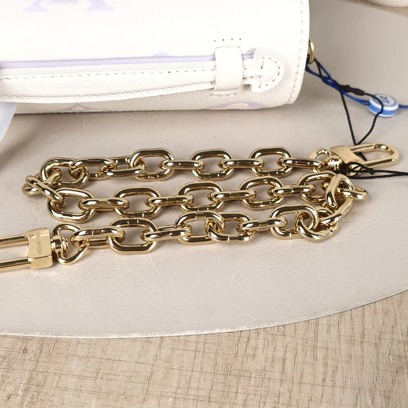 Louis Vuitton Crossbody Bag Pochette Métis East West White · Monogram Empreinte Embossed Calfskin Small 21.5 × 6 × 13.5 cm — detail view 12 of 15