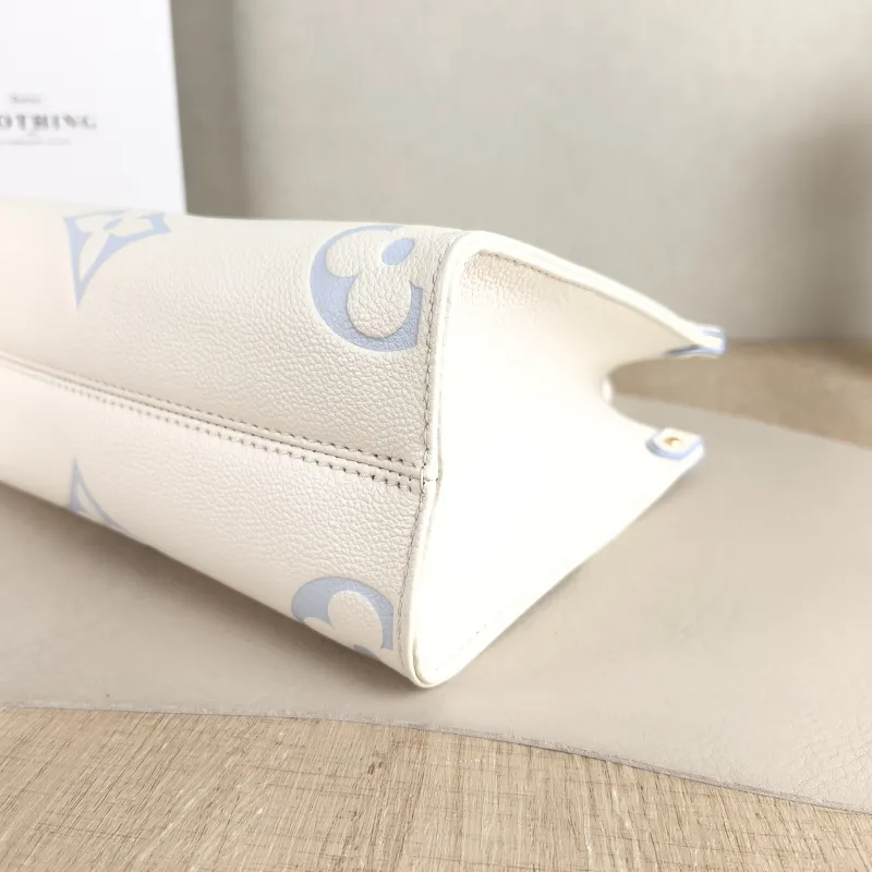 Louis Vuitton Shoulder Bag Onthego White · Blue Monogram Empreinte Embossed Calfskin Small 25 × 11.5 × 19 cm — detail view 11 of 11