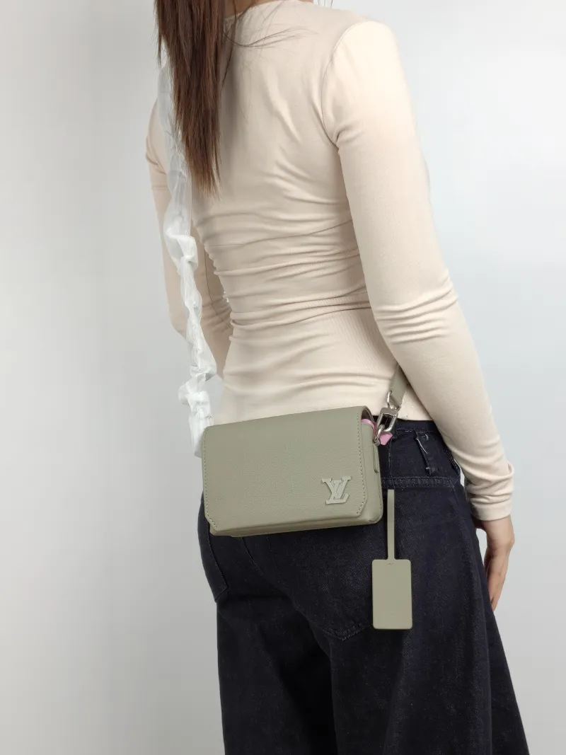 Louis Vuitton Crossbody Bag Fastline Messenger Bag Green Calfskin Mini 17.3 × 7 × 12 cm — on-model view 1 of 2