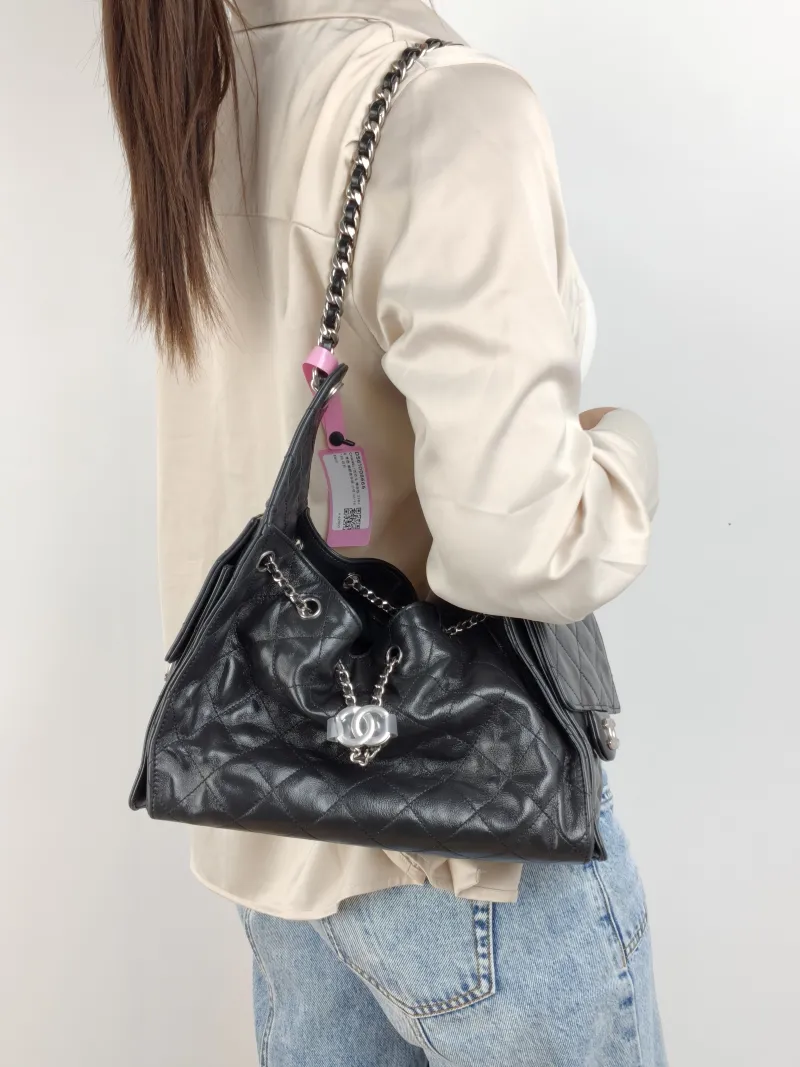 Chanel Shoulder Bag 25Bag Black Waxed Leather Calfskin Small 26 × 14 × 30 cm — on-model view 1 of 2