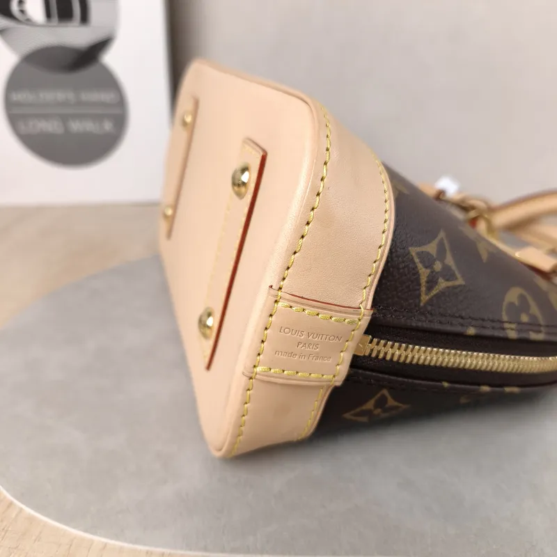 Louis Vuitton Crossbody Bag Alma BB Monogram PVC BB 23.5 × 11.5 × 17.5 cm — detail view 7 of 12