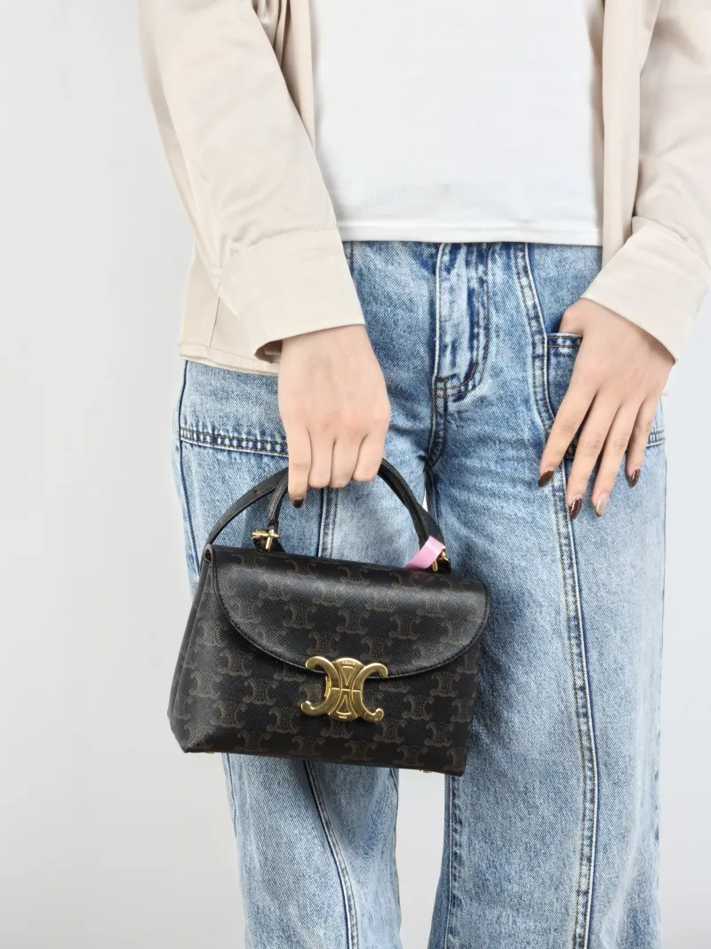 CELINE Top Handle Bag TEEN NINO Top Handle Bag Monogram PVC Small 20 × 8 × 13 cm — on-model view 3 of 3