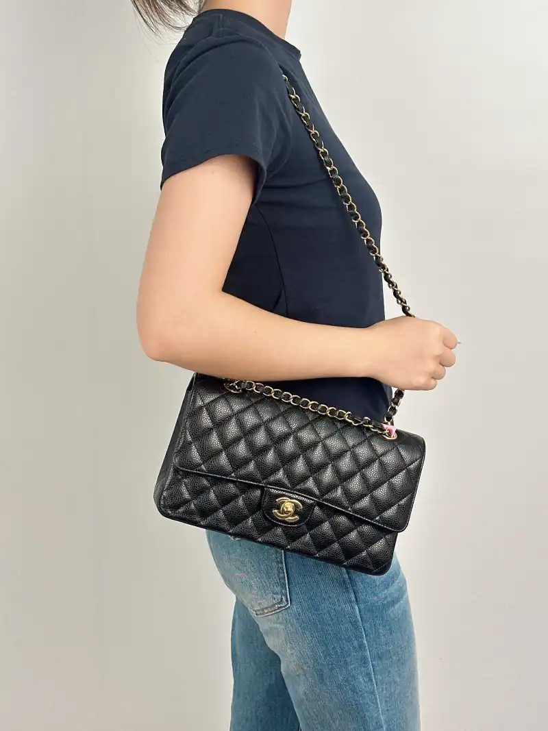 Chanel Crossbody Bag Classic Flap CF Black Grained Calfskin Medium 25.5 × 6.5 × 15.5 cm — on-model view 1 of 2
