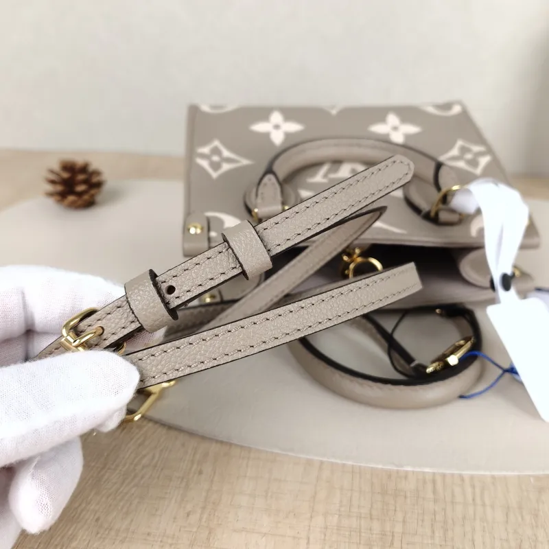 Louis Vuitton Crossbody Bag Onthego BB · White Empreinte Embossed Calfskin Monogram BB18 × 8.5 × 15 cm — detail view 9 of 11