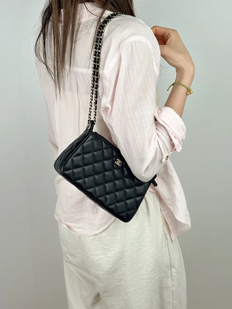 Chanel Crossbody Bag Black Grained Calfskin One Size21 × 5.5 × 12 cm — on-model view 1 of 2