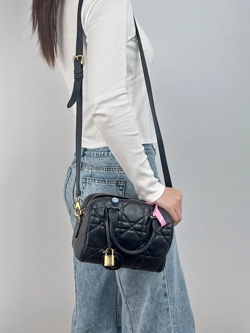 DIOR Crossbody Bag Groove 20 Top Handle Bag Black Calfskin Small 20.5 × 12 × 13.5 cm — on-model view 1 of 3