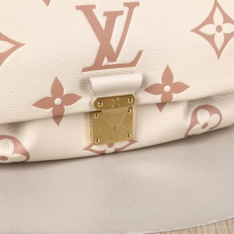 Louis Vuitton Crossbody Bag Favorite White · Pink Empreinte Embossed Calfskin Monogram Medium24 × 9 × 14 cm — detail view 2 of 12