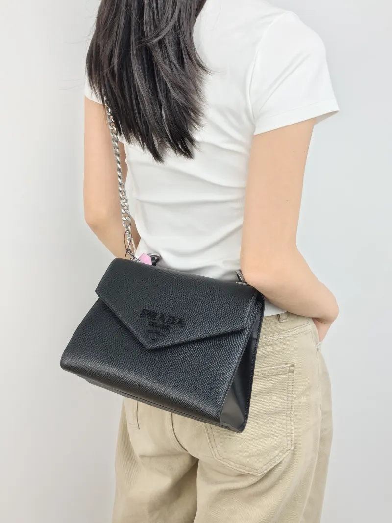 PRADA Shoulder Bag Shoulder Bag Black Calfskin One Size 24 × 12 × 17 cm — on-model view 3 of 3